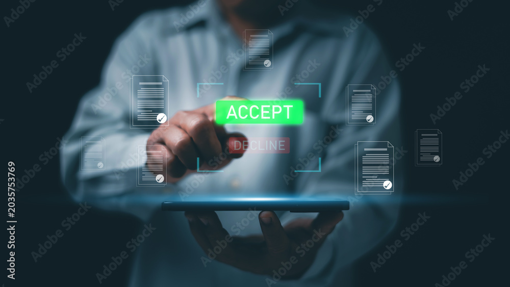 Fototapeta premium Digital approval workflow concept. Man using smartphone with virtual document approval interface showing accept and decline options. Online contract confirmation and paperless decision technology.