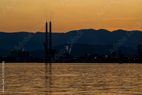 Twilight Silhouette of Shunan Industrial Complex Across the Water in Yamaguchi Japan
