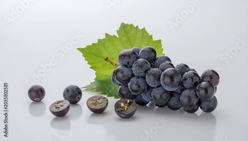 Dark Grapes on White Surface.