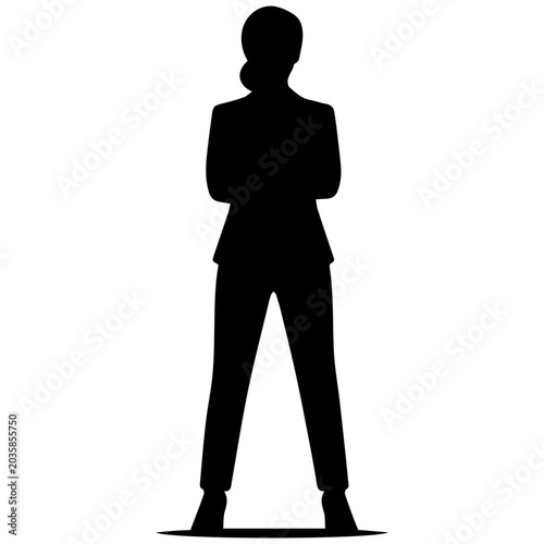Tableau sur toile Silhouette of a confident businesswoman standing with arms crossed in a professi