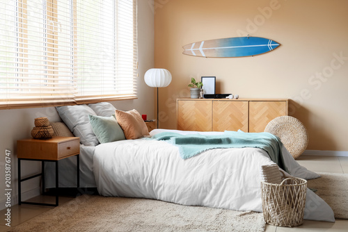 Interior of bedroom with be...
