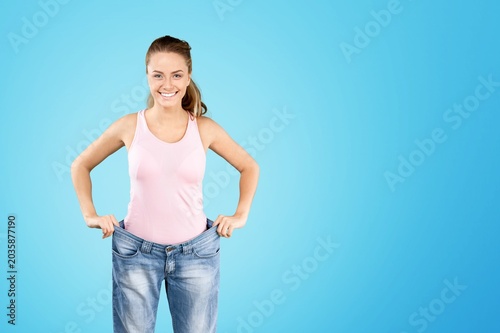 Tableau sur toile Happy dieter concept, woman with big pants
