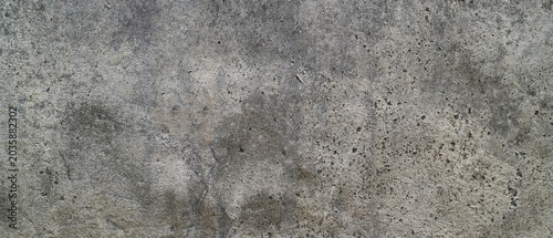 Slika na platnu Grey weathered speckled concrete wall texture, suitable for industrial backgrounds, architectural design projects, urbanthemed digital art, or construction illustrations