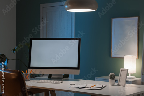 Workplace with blank comput...