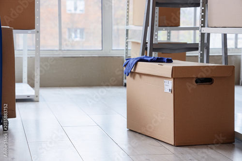 Cardboard box with worker's...