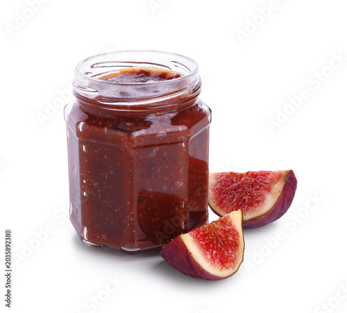 Glass jar of tasty fig jam ...