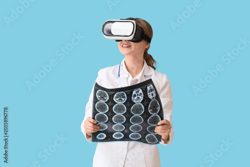 Female doctor in VR glasses...