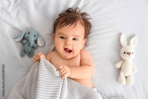 Cute little baby with plaid...