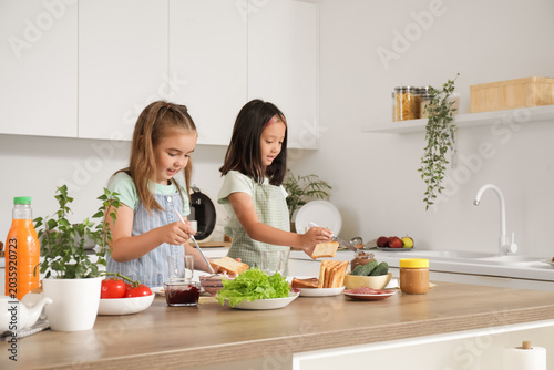 Cute little girls making to...