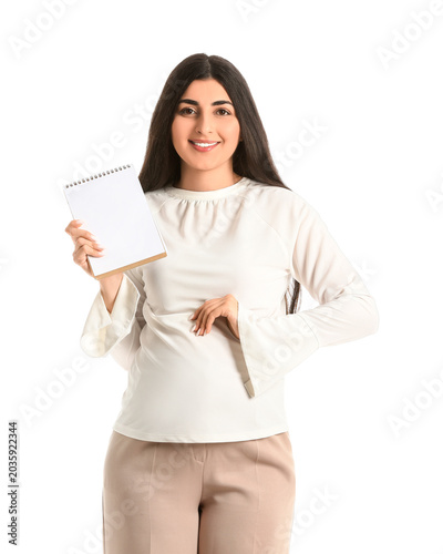Pregnant businesswoman with notebook isolated on white background