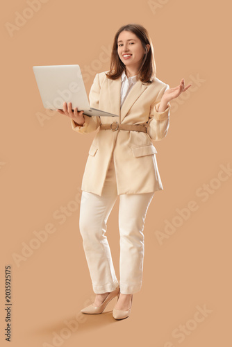 Pretty businesswoman with l...