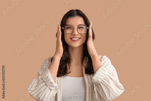 Happy smiling young woman i...