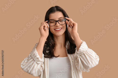 Happy smiling young woman i...