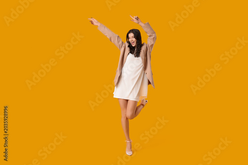 Beautiful young woman in st...