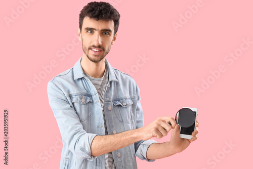 Handsome young man with mag...