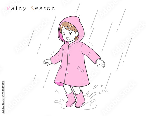 Canvastavla カッパを着た女の子が水たまりで遊んでいる