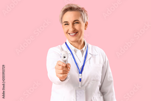 Mature female doctor with i...