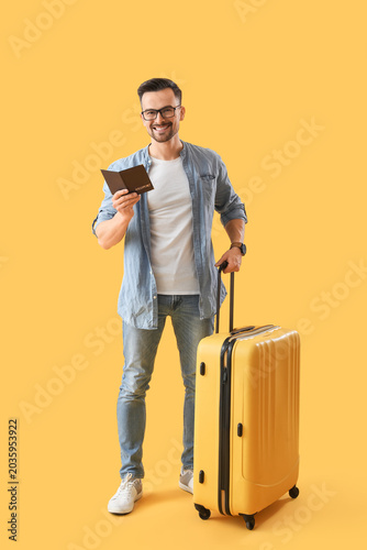 Handsome man with passport ...