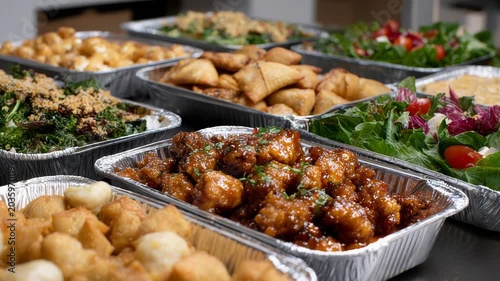 Assorted Asian Takeout Food Trays with Chicken Vegetable and Rice