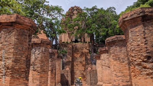 Heritage site in Nha Trang, Vietnam: Ancient Champa Kingdom's Po Nagar Towers surrounded by lush greenery