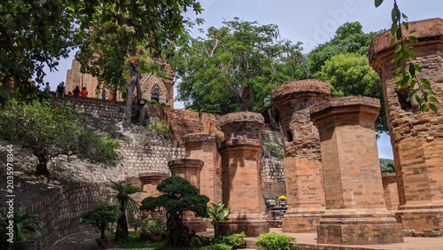 Heritage site in Nha Trang, Vietnam: Ancient Champa Kingdom's Po Nagar Towers surrounded by lush greenery