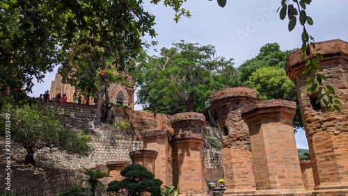 Heritage site in Nha Trang, Vietnam: Ancient Champa Kingdom's Po Nagar Towers surrounded by lush greenery