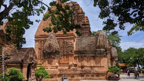 Heritage site in Nha Trang, Vietnam: Ancient Champa Kingdom's Po Nagar Towers surrounded by lush greenery