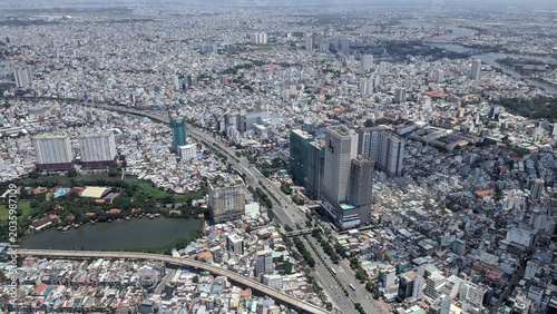 Cityscape in Ho Chi Minh City, Vietnam: Panoramic view of the skyline with the Saigon River and high-rise buildings in 2020