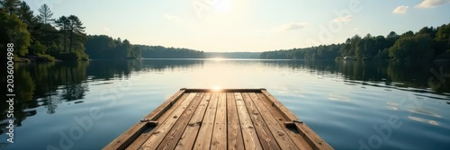 Floating wooden dock on tranquil Swedish lake, sunlit water , summer, landscape