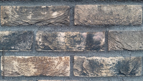 Tableau sur toile Grunge beige brick wall macro texture, rustic burnt clinker brickwork background