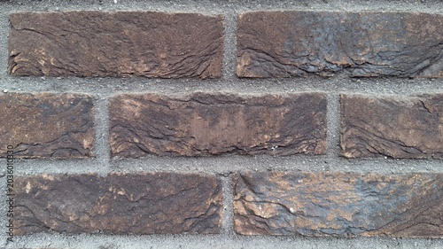 Tableau sur toile Dark charcoal brick wall macro texture, rustic black and grey clinker brickwork