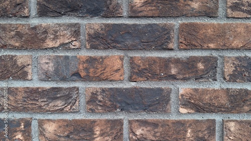 Foto Dark brown and terracotta brick wall texture, vintage clinker brickwork backgrou