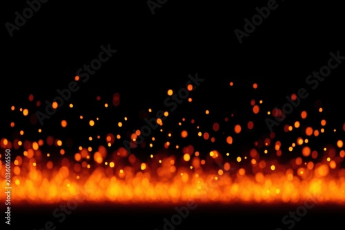A vibrant display of glowing orange sparks against a dark background.