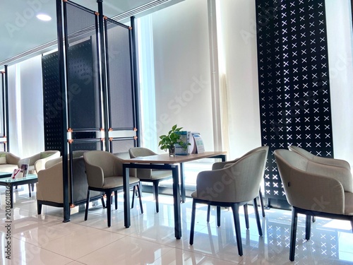 Contemporary Furniture Arrangement Neutral Tones Relaxing Reception Space