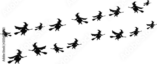 Photos Halloween witch silhouettes flying on broomsticks