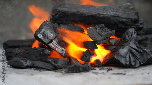 Burning Charcoal Emitting Intense Heat and Glowing Embers