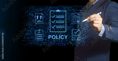 Photos Businessman using stylus pen touching digital corporate policy checklist on futuristic virtual screen, compliance, regulation, and data governance concept