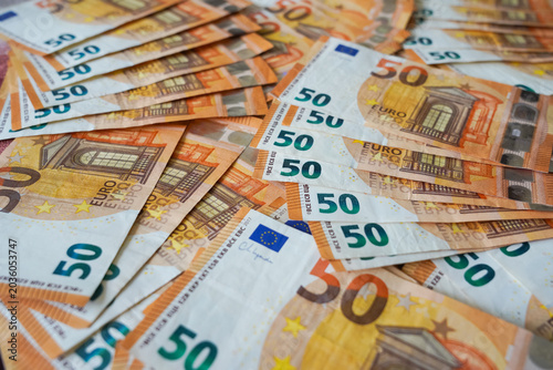 Картината върху платно Wide composition of 50 euro bills spread randomly, representing financial abunda