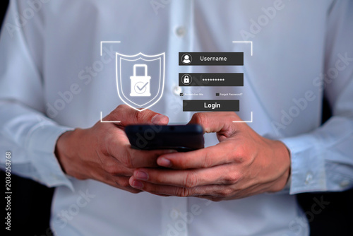 Close up of user accessing secure internet account with username password and shield login interface