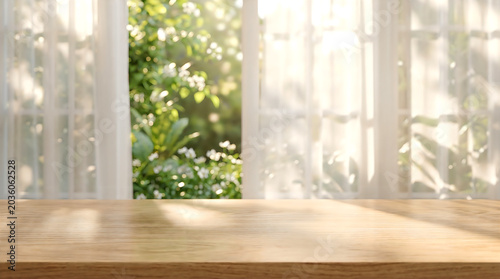 Wooden table top on blurred garden window background with sun light for nature product mockup and summer display.