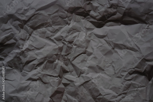 Foto Crumpled black paper wrinkled texture background
