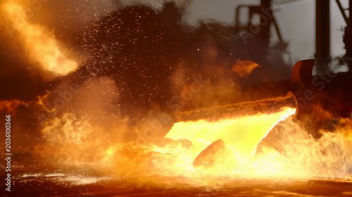 Steel Eruption Spectacle. Dynamic Depiction Of Hot Steel Pouring Amidst Bright Sparks And Smoke