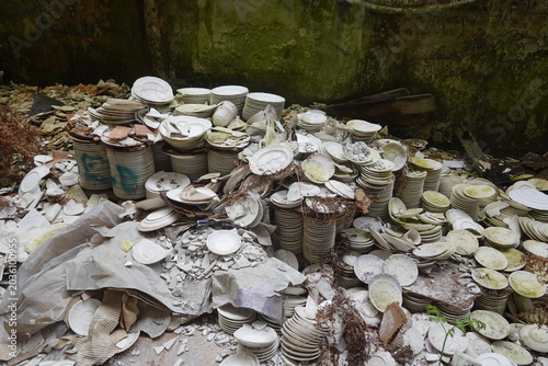 Fotografie Abandoned porcelain factory piling broken ceramic plates