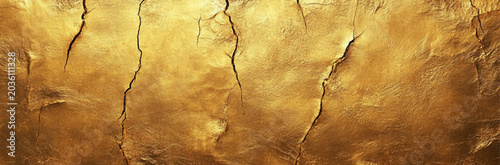 Valokuva Shiny yellow leaf gold foil texture concrete wall background