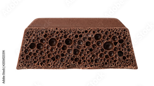Aerated chocolate bar slice showing bubble texture isolated on transparent background porous dessert.