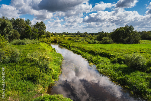 Canvas-taulu lowland landscape with the Krzna River near its confluence with the Bug Riverlow