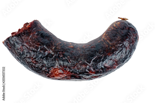Piece of black pudding isolated in a white background. Top view
