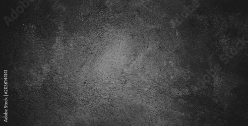 Foto Dark grey rough weathered stone concrete wall texture for gritty designs