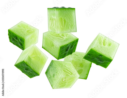 Dynamically falling cucumber cubes isolated for food designers for the fresh design of salad and detox recipes on a transparent background to inspire a desire for a low-calorie diet