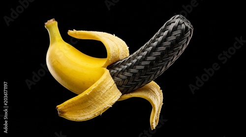 Surreal Conceptual Banana with Carbon Fiber Interior on Black Background